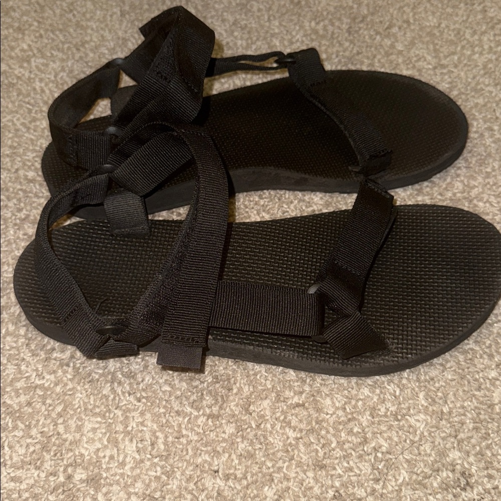 Black Teva foam Sandals